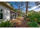 Screened patio overlooking a spacious backyard garden at 421 Riviera St, Venice, FL 34285