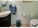 Updated bathroom with pedestal sink and walk-in shower at 421 Riviera St, Venice, FL 34285