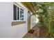 Guest house exterior with green door and brick pathway at 421 Riviera St, Venice, FL 34285