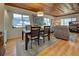 Bright dining area with hardwood floors and wood ceiling at 421 Riviera St, Venice, FL 34285