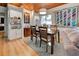 Dining area with wood table and chairs, and wood ceiling at 421 Riviera St, Venice, FL 34285