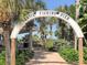 Entrance to Venice Fishing Pier with palm trees at 421 Riviera St, Venice, FL 34285