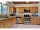 Modern kitchen with granite countertops and stainless steel appliances at 421 Riviera St, Venice, FL 34285