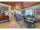 Living Room with hardwood floors, cozy seating and wood ceiling at 421 Riviera St, Venice, FL 34285