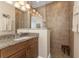 Bathroom includes a walk-in shower and granite countertops at 4370 Turnberry Cir, North Port, FL 34288