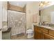 Clean bathroom with shower/tub combo and granite vanity at 4370 Turnberry Cir, North Port, FL 34288