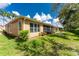 Well-maintained house exterior with lush landscaping at 4370 Turnberry Cir, North Port, FL 34288