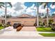 Beautiful villa with three-car garage and landscaping at 4370 Turnberry Cir, North Port, FL 34288