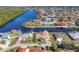 Stunning aerial view showcasing the property's waterfront location and neighborhood at 4557 Colleen St, Port Charlotte, FL 33952