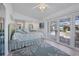 Relaxing bedroom with a view of the pool from the sliding doors at 4557 Colleen St, Port Charlotte, FL 33952