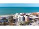 Aerial view of beachfront condos with pool; close to beach access at 50 Meredith Dr # 12, Englewood, FL 34223