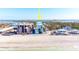 Aerial view of beachfront property, showcasing its location and proximity to the ocean at 50 Meredith Dr # 12, Englewood, FL 34223