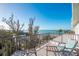 Spacious balcony with ocean views and seating at 50 Meredith Dr # 12, Englewood, FL 34223