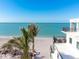 Beachfront property with palm trees and ocean views at 50 Meredith Dr # 12, Englewood, FL 34223