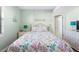 Bedroom with coastal decor and ocean view at 50 Meredith Dr # 12, Englewood, FL 34223