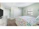 Bedroom with coastal decor and ocean view at 50 Meredith Dr # 12, Englewood, FL 34223