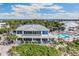 Aerial view of resort clubhouse and pool area near the beach at 5000 Gasparilla Rd # 48, Boca Grande, FL 33921