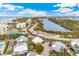 Aerial view of home near water; shows surrounding area at 5000 Gasparilla Rd # 48, Boca Grande, FL 33921