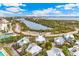 Waterfront property view with tennis courts and canal access at 5000 Gasparilla Rd # 48, Boca Grande, FL 33921