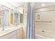 Bathroom with tub, shower, and starfish decor at 5000 Gasparilla Rd # 48, Boca Grande, FL 33921