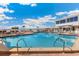 Relaxing resort pool with ocean views and comfortable lounge chairs at 5000 Gasparilla Rd # 48, Boca Grande, FL 33921