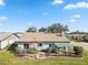 Aerial view showing patio and backyard at 601 Bramblewood Ln, Englewood, FL 34223