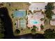 Community features pool, tennis court, shuffleboard at 601 Bramblewood Ln, Englewood, FL 34223