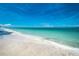 Beautiful beach with white sand and clear water at 601 Bramblewood Ln, Englewood, FL 34223