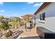 Patio with a dining table, umbrella, and ample space at 601 Bramblewood Ln, Englewood, FL 34223