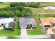 House and neighborhood view from above at 70 Marker Rd, Rotonda West, FL 33947