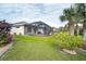 Home's backyard with pool and patio at 70 Marker Rd, Rotonda West, FL 33947