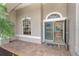 Inviting entryway with double doors and a decorative mat at 70 Marker Rd, Rotonda West, FL 33947