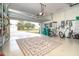 Organized garage with storage and flooring at 70 Marker Rd, Rotonda West, FL 33947