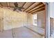 Unfinished bedroom with exposed beams and wood walls at 701 W Perry St, Englewood, FL 34223