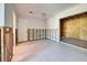 Unfinished bedroom with exposed walls and flooring at 701 W Perry St, Englewood, FL 34223