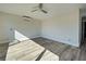 Bright bedroom with wood-look floors and water views at 701 W Perry St, Englewood, FL 34223