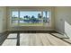 Bright living room with water views at 701 W Perry St, Englewood, FL 34223