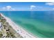 Expansive aerial view of a beautiful beach with turquoise waters at 7510 Kenway St, Englewood, FL 34224