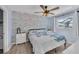 Bedroom with a comfortable bed and a coastal-themed atmosphere at 7510 Kenway St, Englewood, FL 34224