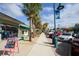 Englewood Avenue storefront with palm trees and parked cars at 7510 Kenway St, Englewood, FL 34224