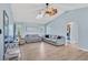 Relaxing living room with gray sofas and natural light at 7510 Kenway St, Englewood, FL 34224