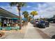 Outdoor seating at a coffee shop with turquoise accents at 7510 Kenway St, Englewood, FL 34224