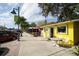 Quaint street view of Downtown Jewelers with outdoor seating and colorful storefronts at 7510 Kenway St, Englewood, FL 34224