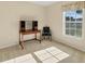 Bright bedroom with a desk, chair, and window at 80 Long Meadow Ln, Rotonda West, FL 33947