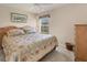 Bedroom with king-size bed and plenty of closet space at 80 Long Meadow Ln, Rotonda West, FL 33947