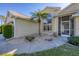 House entrance with a screened door and landscaped walkway at 80 Long Meadow Ln, Rotonda West, FL 33947