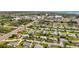 Aerial view of neighborhood with houses and roads at 839 E 4Th St, Englewood, FL 34223