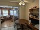 Dining area with table and access to porch at 839 E 4Th St, Englewood, FL 34223