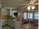 Kitchen with access to enclosed porch at 839 E 4Th St, Englewood, FL 34223