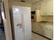 Kitchen with refrigerator and built-in oven at 839 E 4Th St, Englewood, FL 34223